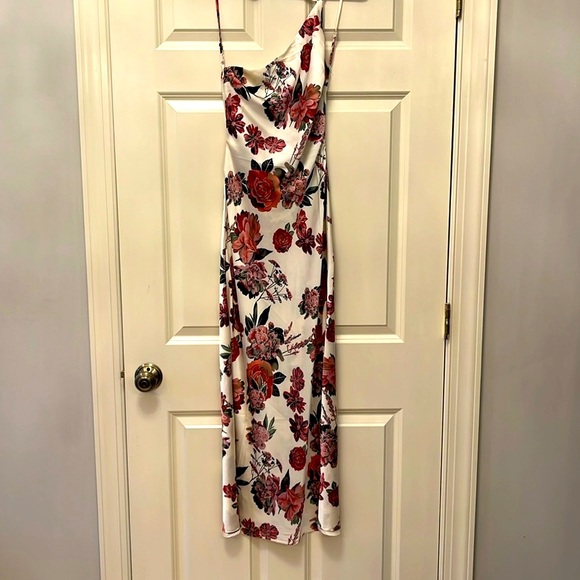 NWOT! Gorgeous silky asymmetrical dress. Has a draped scoop back. - Picture 4 of 11